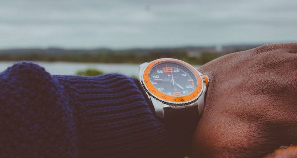Canva - Photo of a Man Wearing Wristwatch