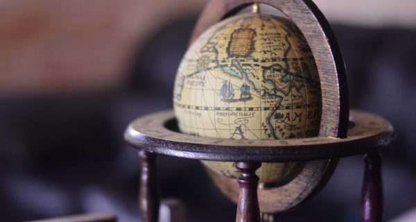 Canva - Shallow Focus Photography of Brown Globe